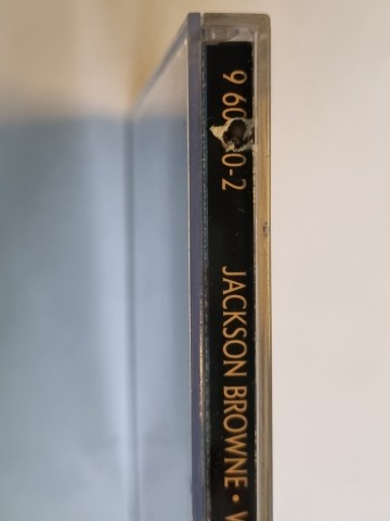 Gaatje in randje achterinlay  cd jackson browne   world in motion   0075596083027